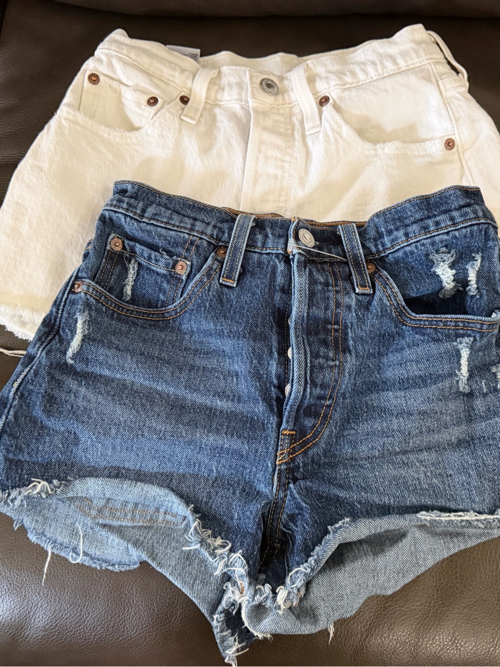 Levi's Distressed Blue Denim and White Jean Cutoff Shorts